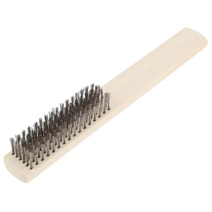 Brosse métallique en acier inoxydable, manche en bois, surface métallique, livres, scories de soudag
