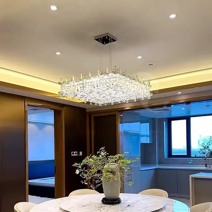Lustre moderne suspendu fer et verre transparent pour salon élégant design contemporain à offrir pour occasions spéciales