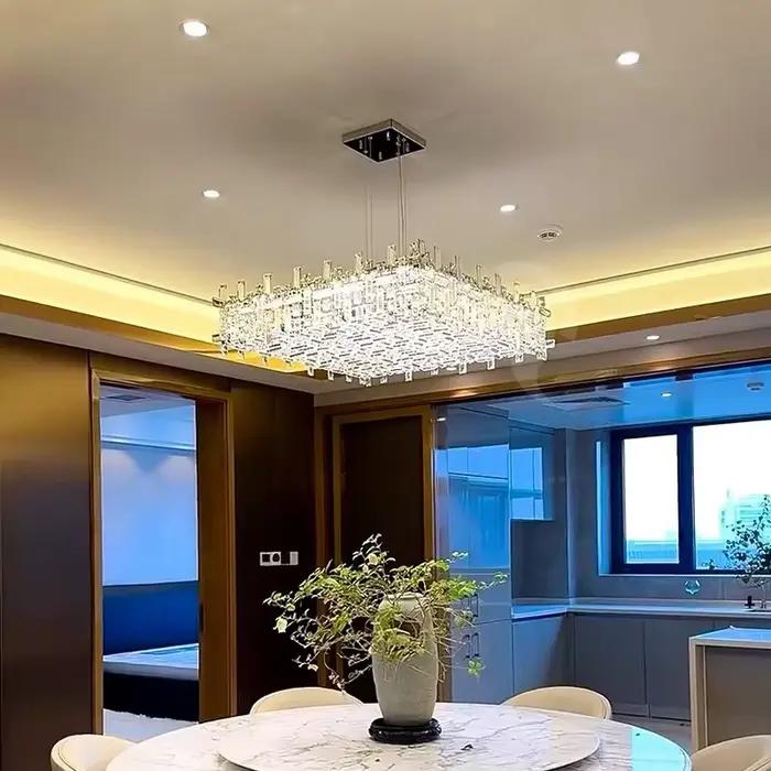 Lustre moderne suspendu fer et verre transparent pour salon élégant design contemporain à offrir pour occasions spéciales