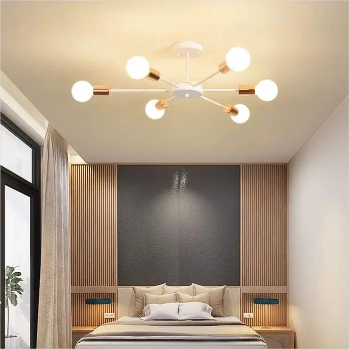 Plafonnier industriel en métal au design moderne, composé de plusieurs luminaires, finition peinte en Sputnik, idéal pour un salon